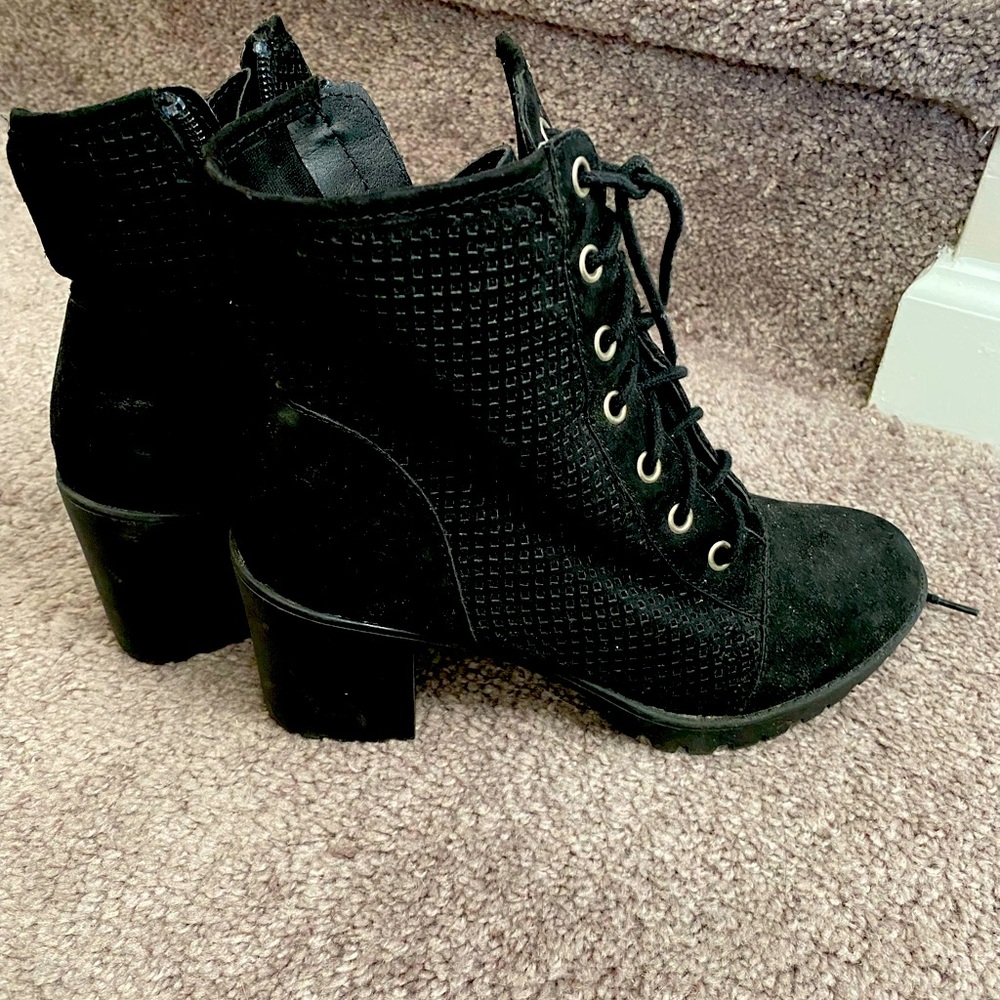 High heeled black boots